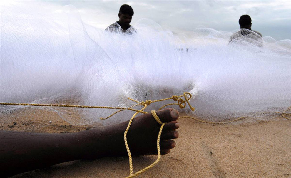Лучшие фото недели: индийские рыбаки